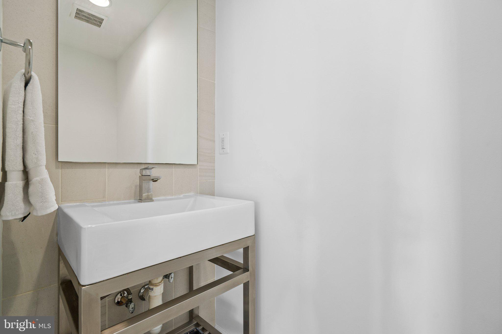 1042 Delf Drive McLean, VA 22101 - Photo 14 of 29 powder room off the living area