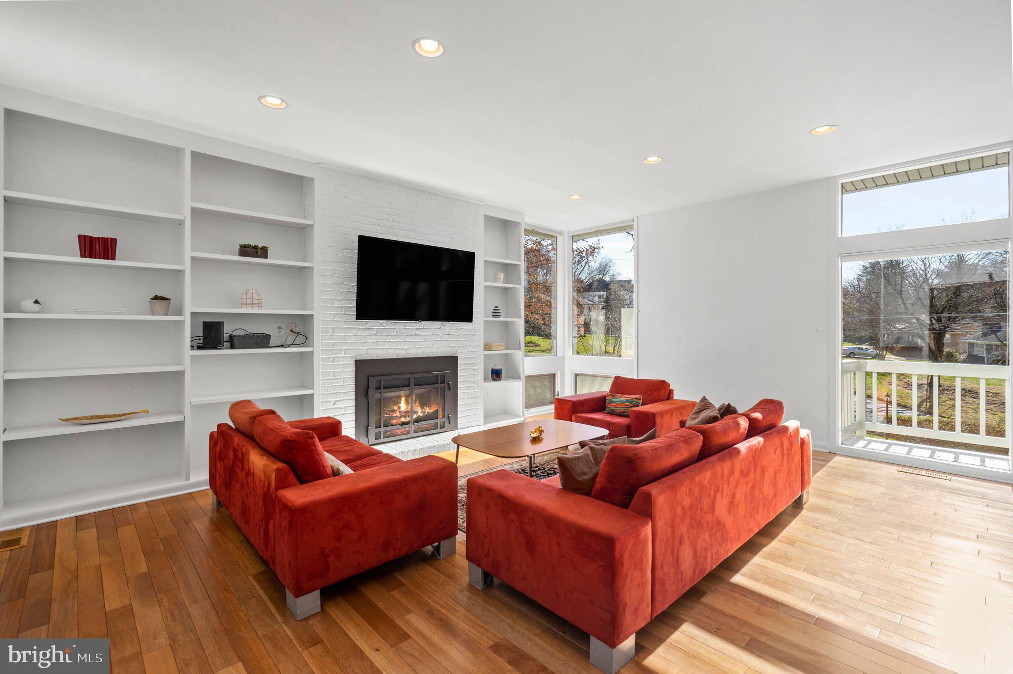 1042 Delf Drive McLean, VA 22101 - Photo 4 of 29 Living room with fireplace and built ins