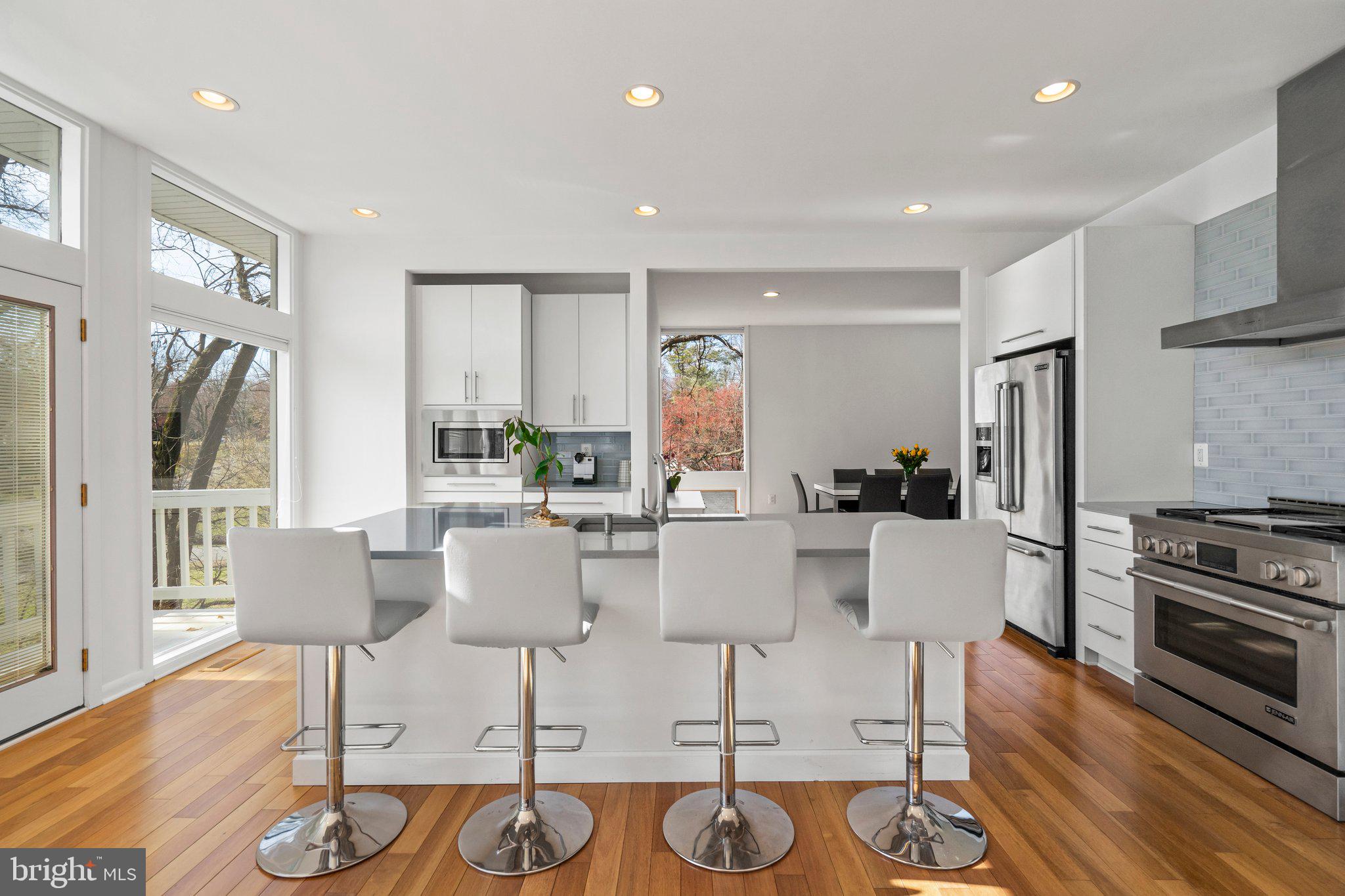 1042 Delf Drive McLean, VA 22101 - Photo 6 of 29 kitchen (with island open to dining/living spaces