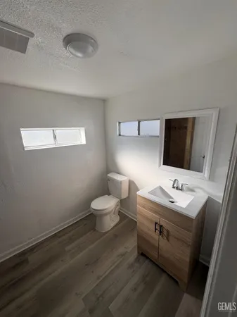 wooden floor and chair in a room