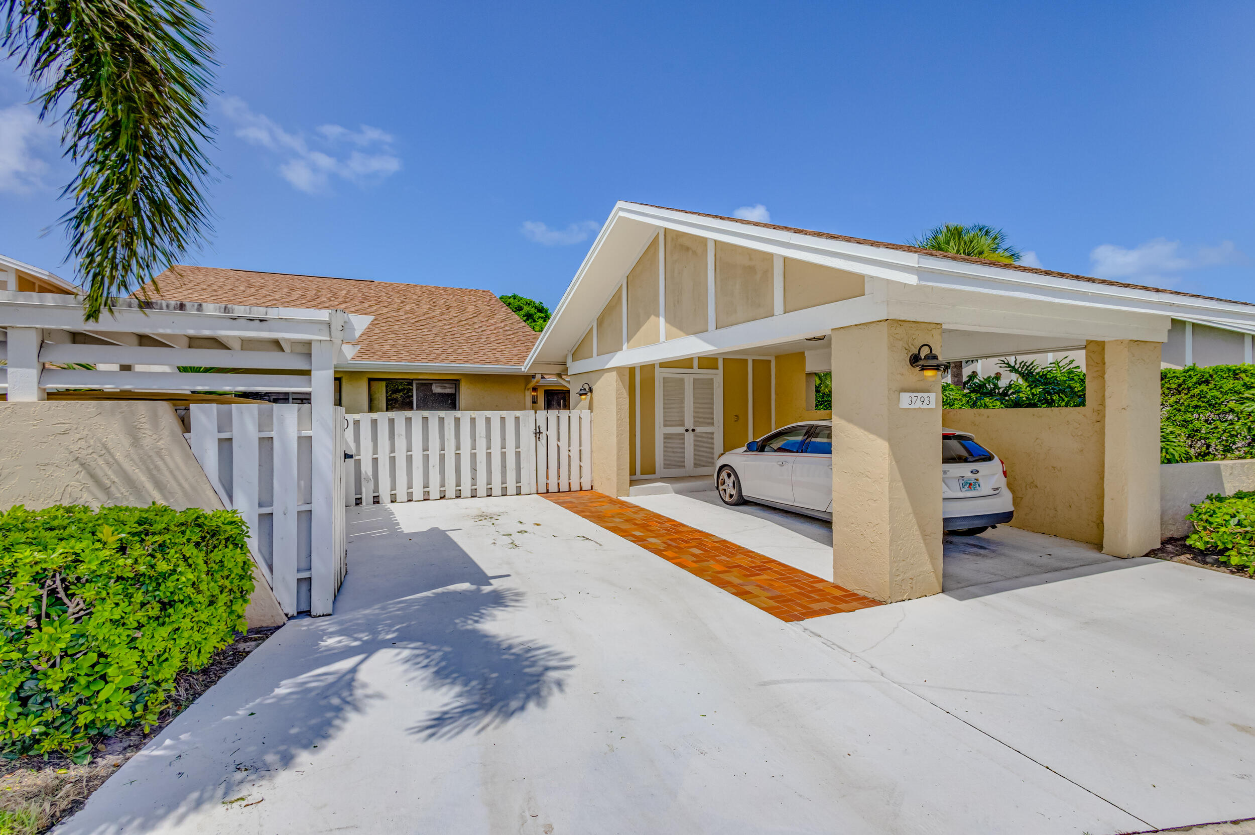 3793 Cape Pointe Circle Jupiter, FL 33477 - Photo 1 of 20 a house view with a garden space