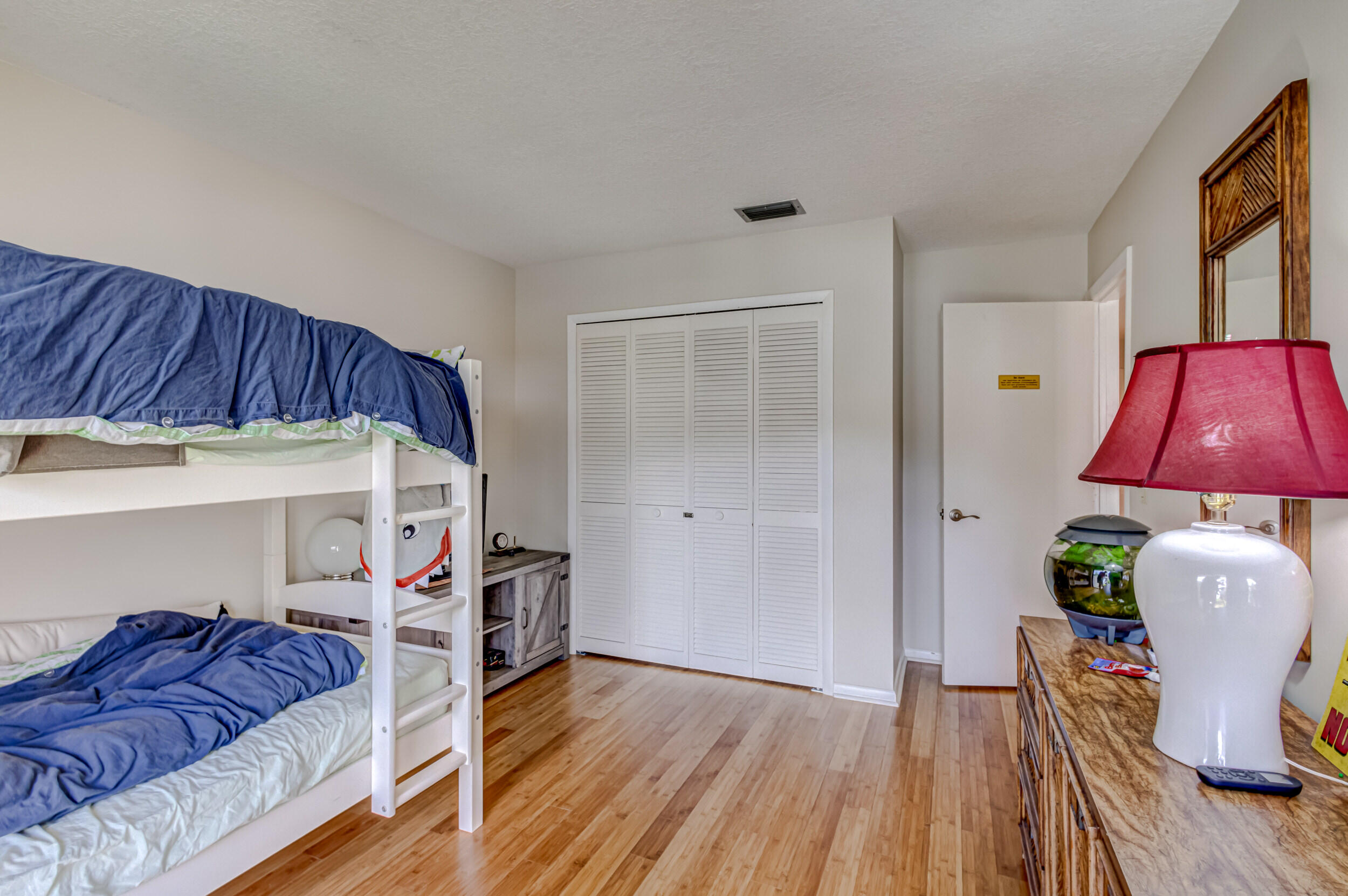 3793 Cape Pointe Circle Jupiter, FL 33477 - Photo 17 of 20 a bedroom with furniture and a bed