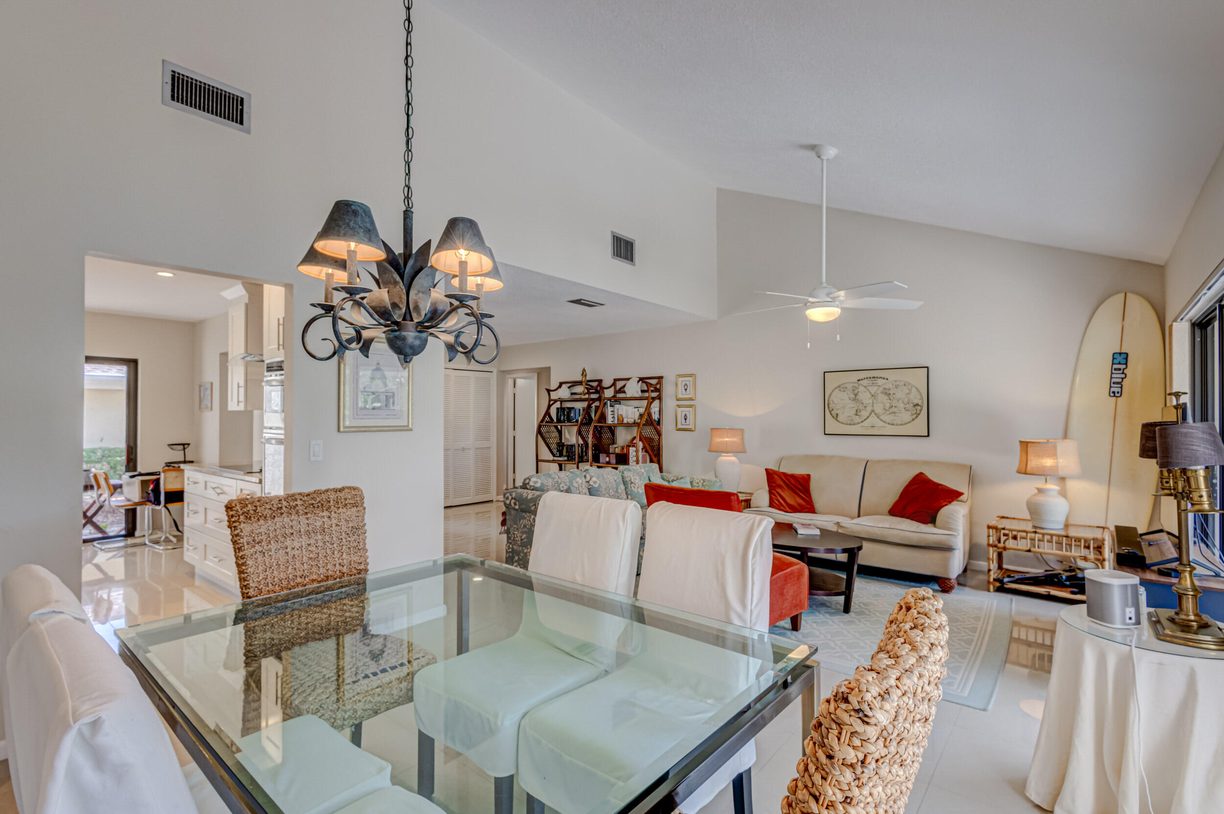 3793 Cape Pointe Circle Jupiter, FL 33477 - Photo 5 of 20 a living room with dining room and wooden floor