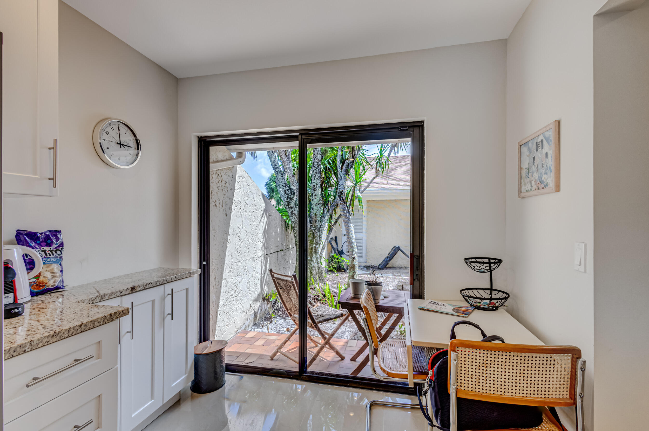 3793 Cape Pointe Circle Jupiter, FL 33477 - Photo 9 of 20 a living room with furniture and a window