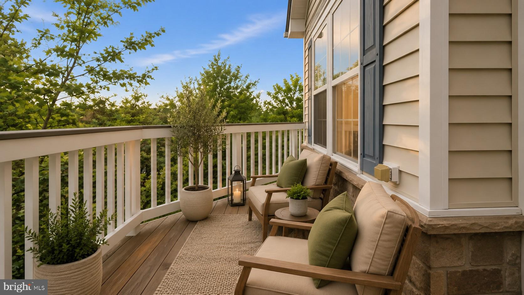 42371 Trellis Square Brambleton, VA 20148 - Photo 56 of 70 Serene balcony with lush greenery.