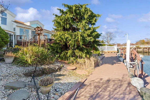 a view of a backyard of the house