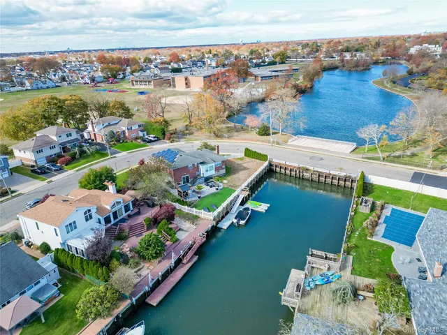 an aerial view of a house with a garden