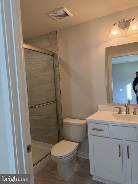 89 Tumblehome Road Inwood, WV 25428 - Photo 5 of 20 a bathroom with a sink toilet and shower