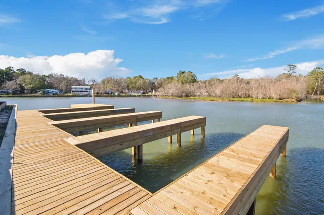 a view of swimming pool with lounge chair