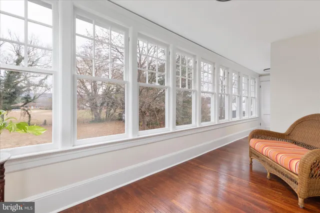 an aerial view of a house with a lake view