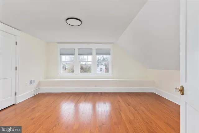 a aerial view of a house with a swimming pool