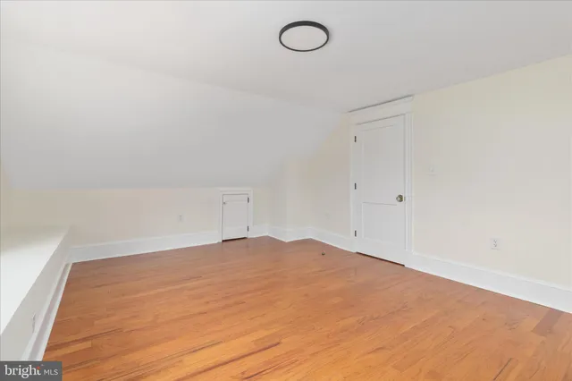 a front view of a building with glass windows and door