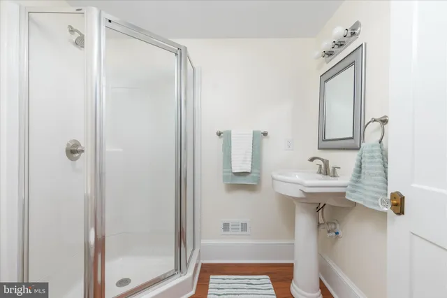 a view of a lake with a building in the background