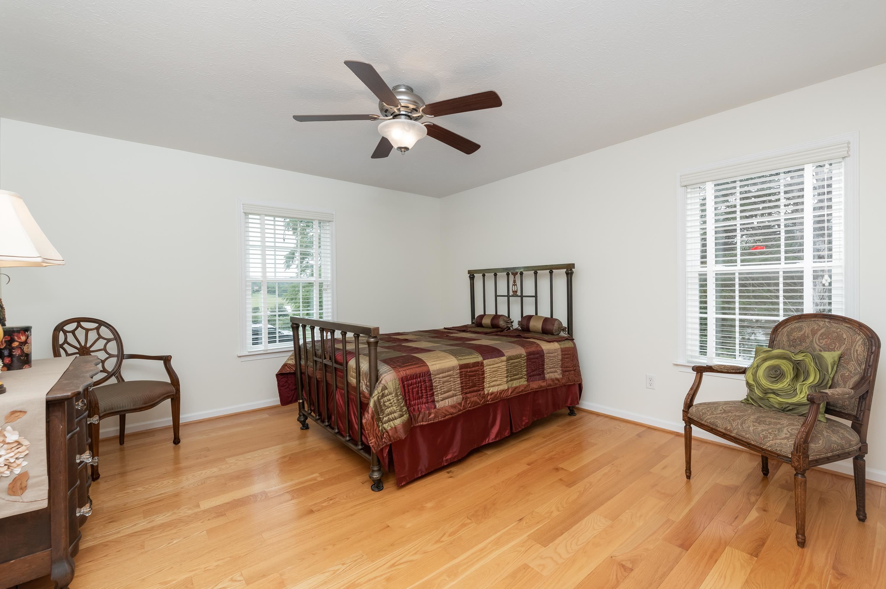 3934 Shutterlee Mill Road Staunton, VA 24401 - Photo 27 of 49 a bedroom with a bed chair and window