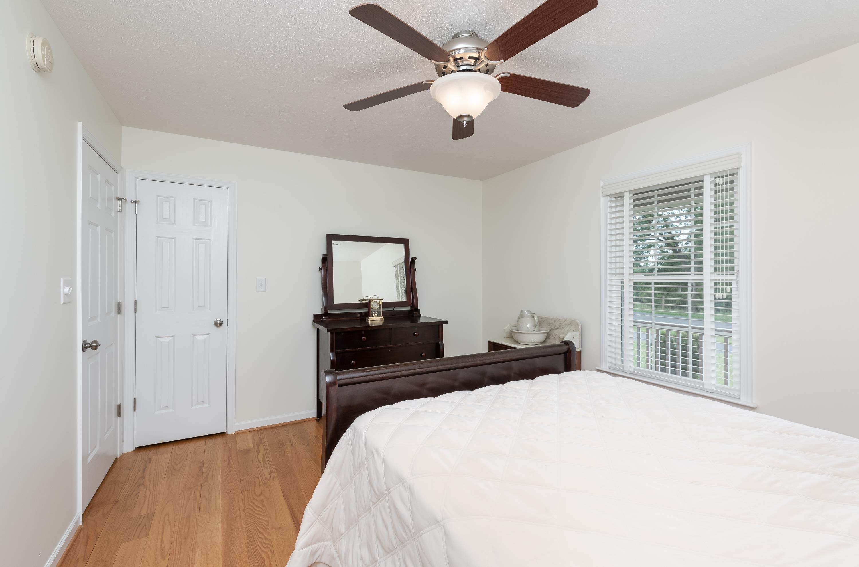 3934 Shutterlee Mill Road Staunton, VA 24401 - Photo 30 of 49 a bedroom with a bed and a tv