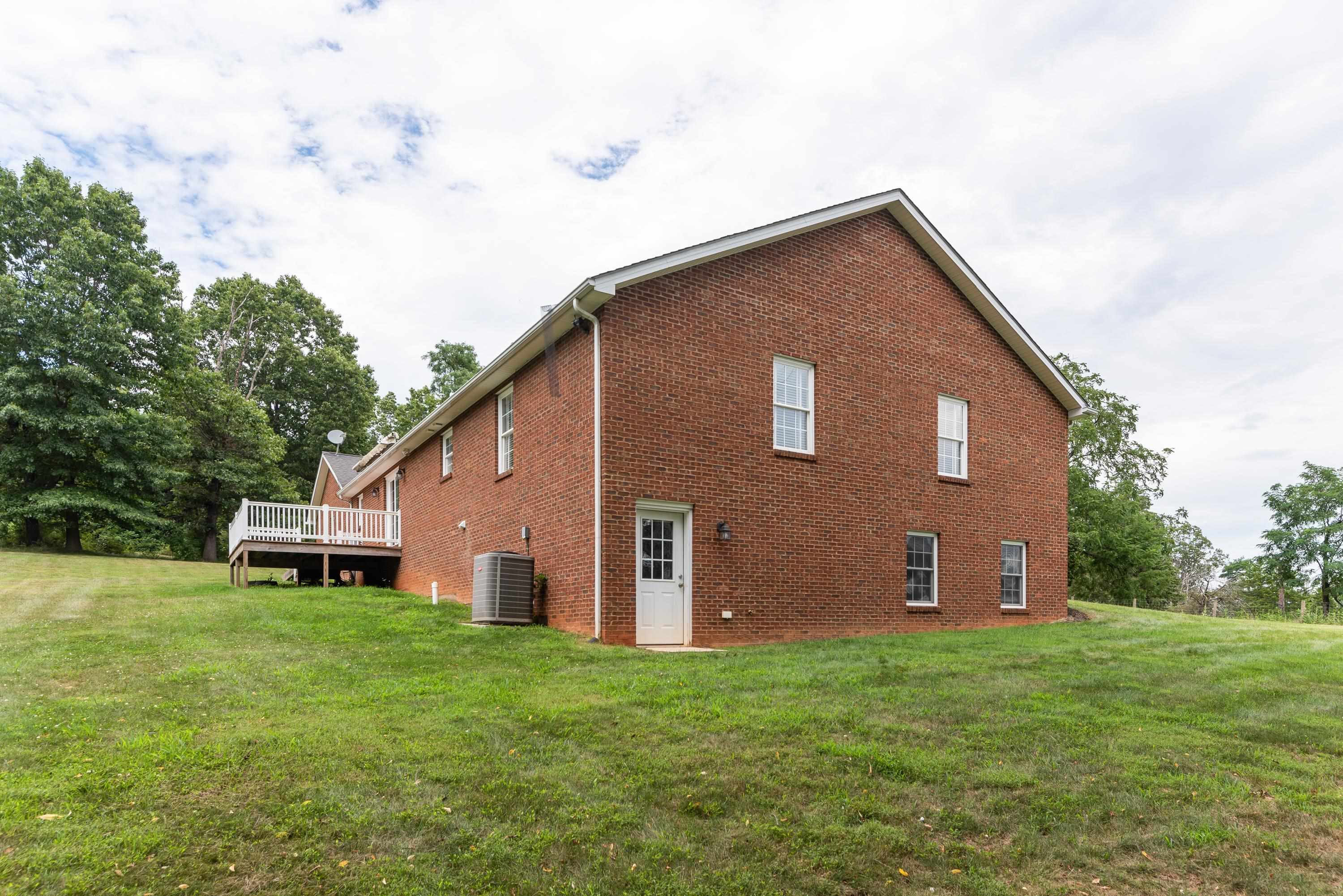 3934 Shutterlee Mill Road Staunton, VA 24401 - Photo 38 of 49 a view of a house with a yard
