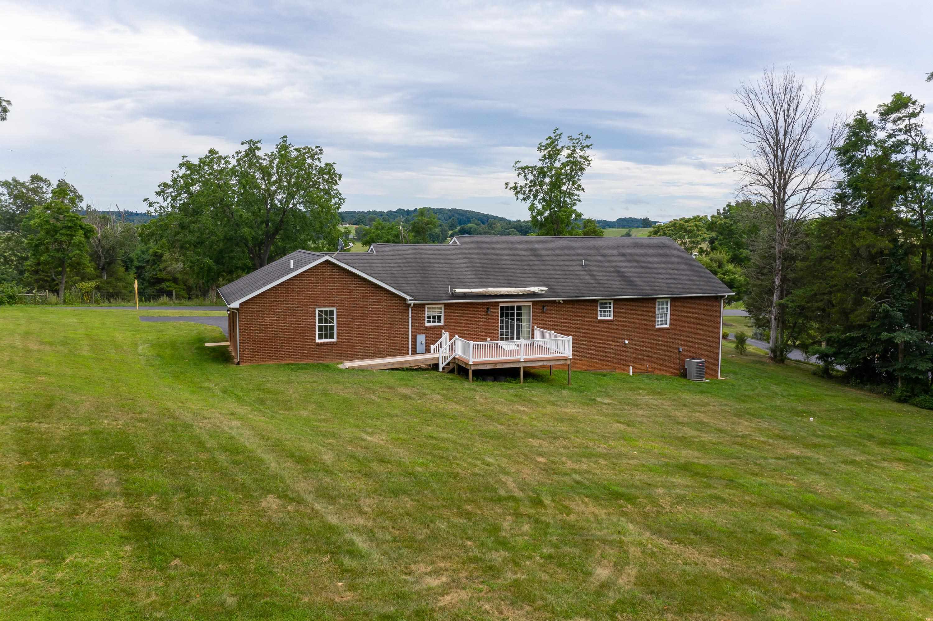 3934 Shutterlee Mill Road Staunton, VA 24401 - Photo 40 of 49 a house view with a garden space