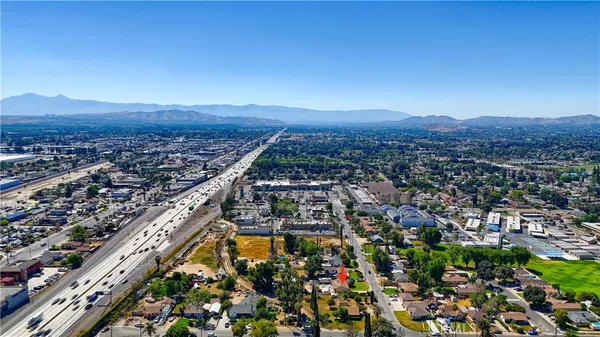 an aerial view of residential houses and city street