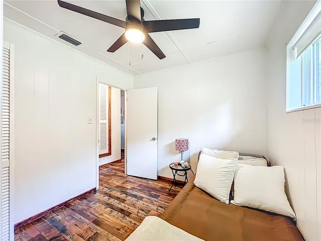 a view of a house with porch and sitting area