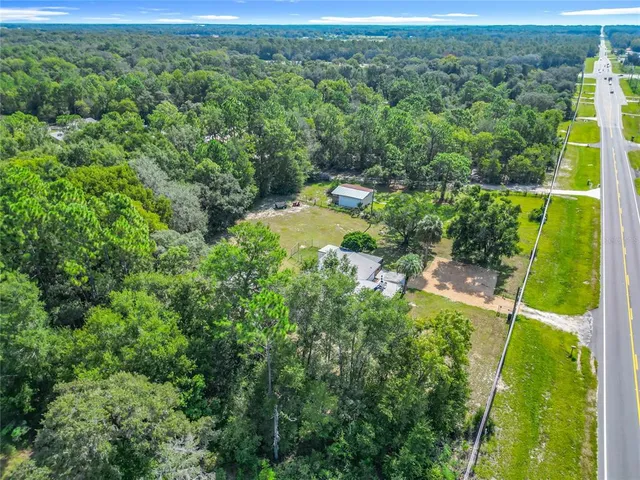 a backyard of a house with lots of green space