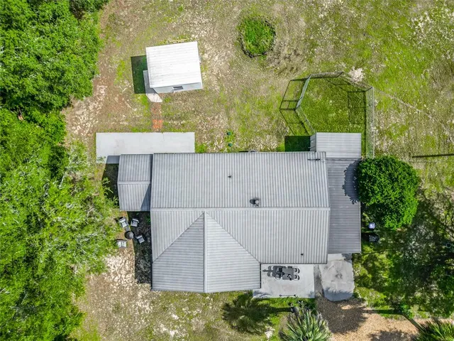 a kitchen with a refrigerator and a sink