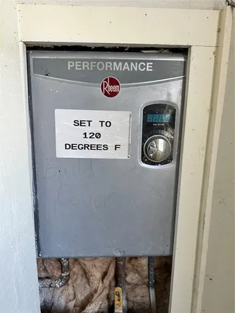 a utility room with washer and dryer