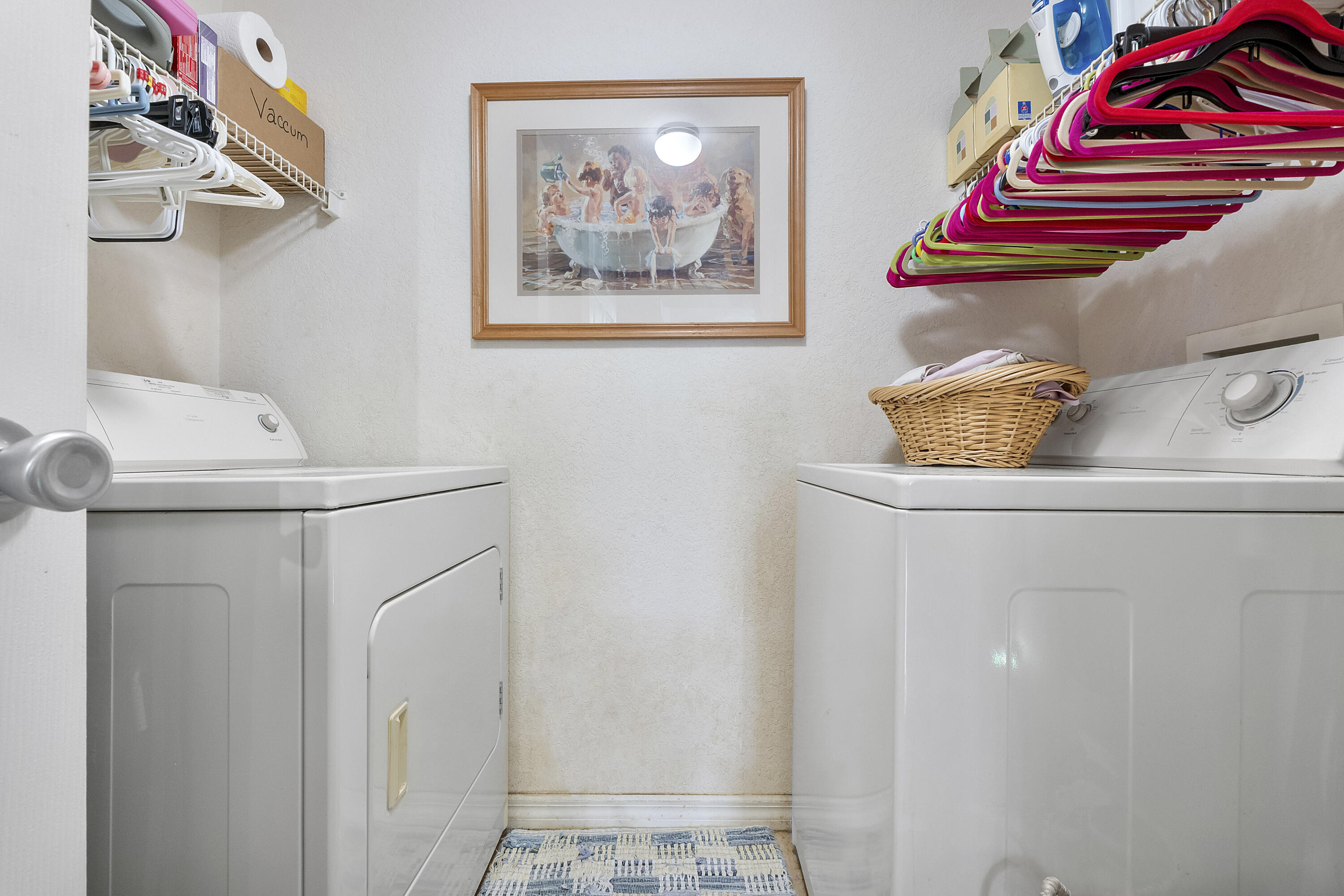 6592 West Sample Road, Unit 6592 Coral Springs, FL 33067 - Photo 18 of 42 a utility room with dryer and washer