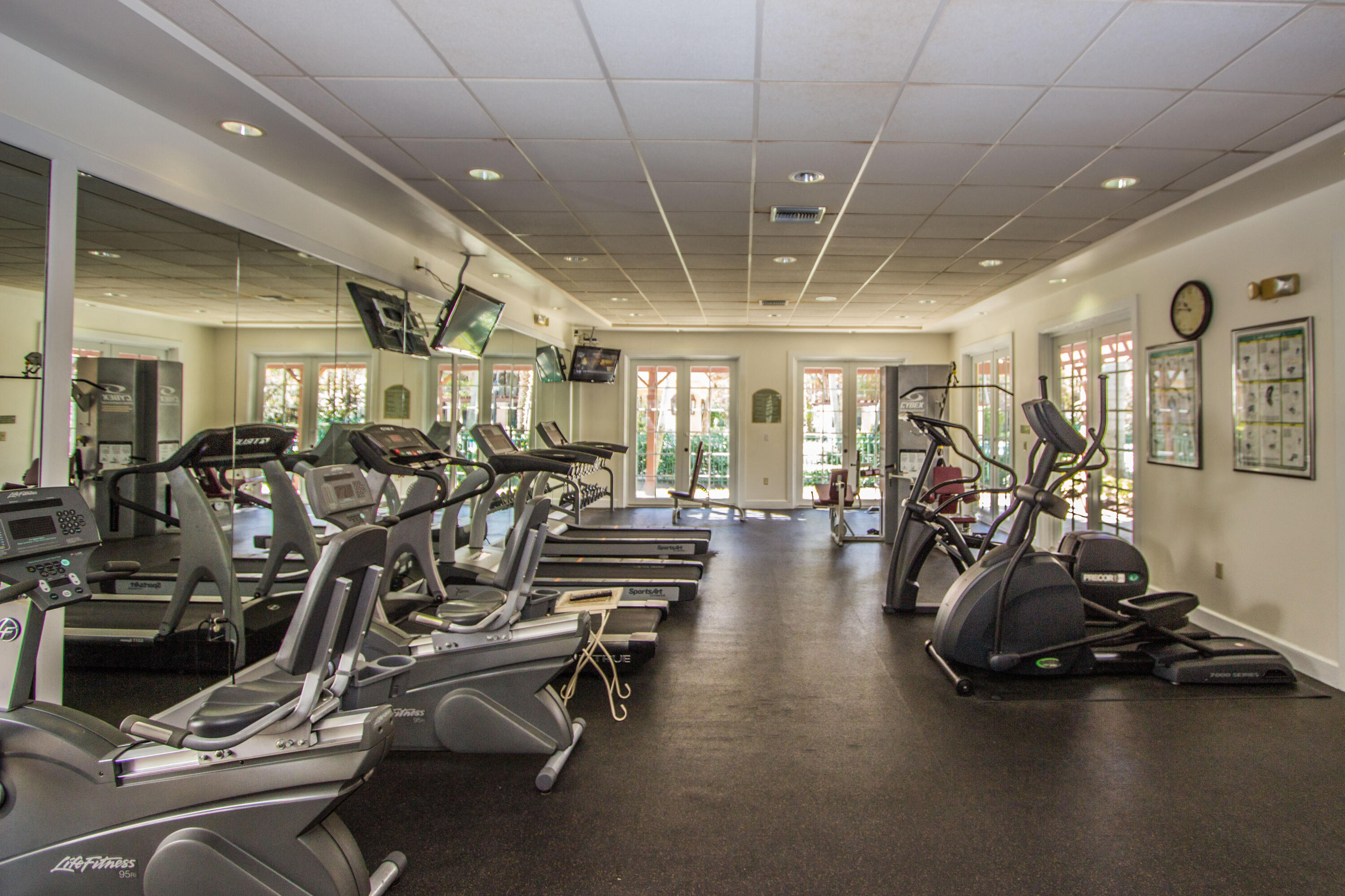 6592 West Sample Road, Unit 6592 Coral Springs, FL 33067 - Photo 36 of 42 a view of a room with gym equipment