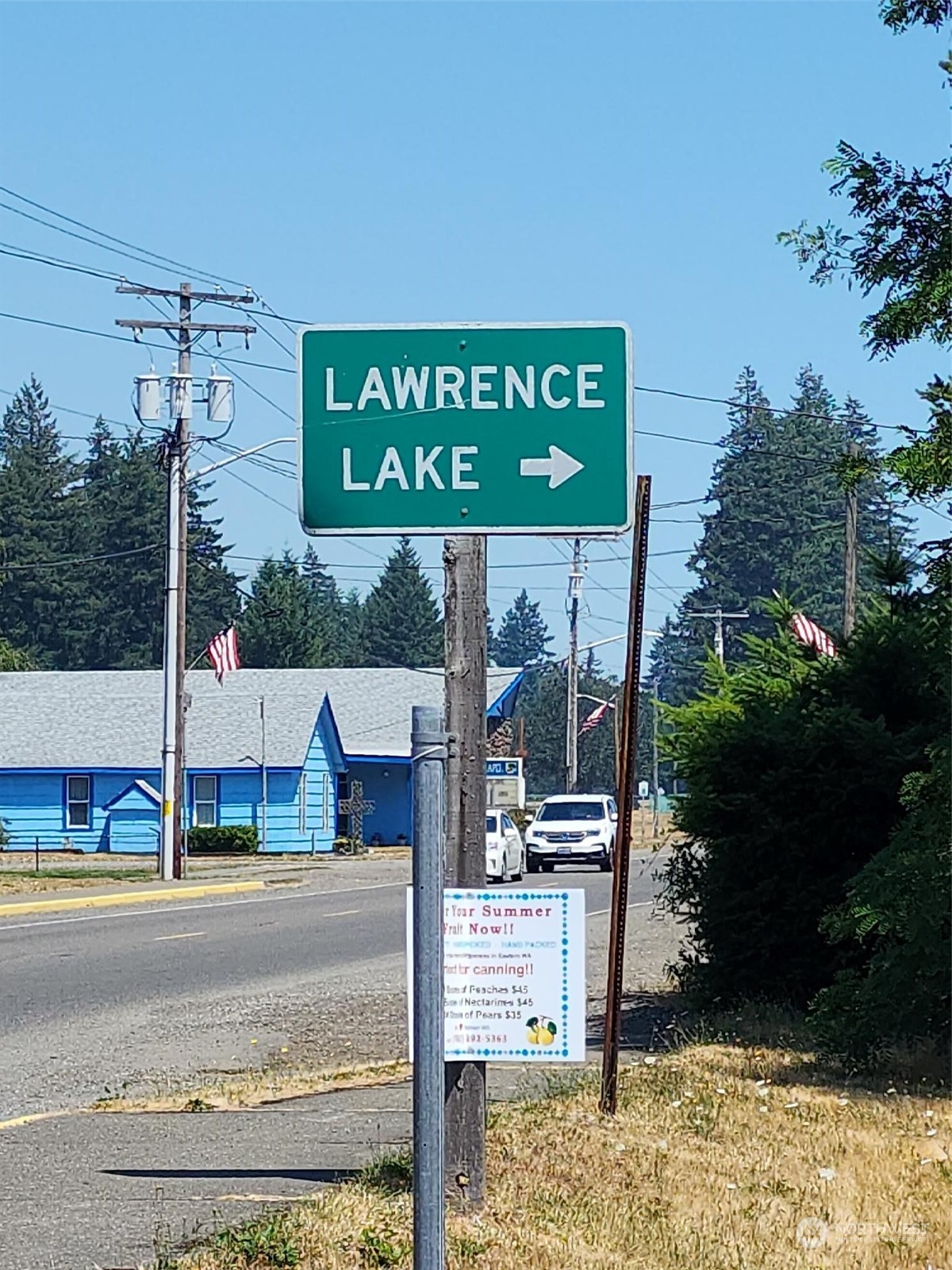 15545 Runyon Road Southeast Rainier, WA 98576 - Photo 24 of 25 a sign that is on the side of a road