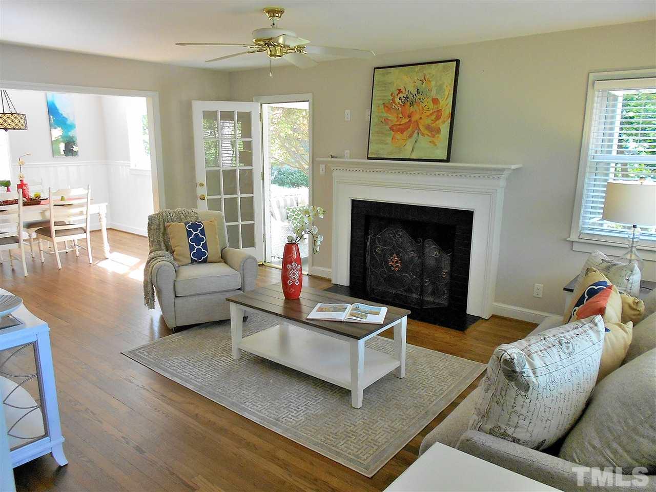 3307 Hall Place Raleigh, NC 27607 - Photo 2 of 24 a living room with furniture and a fireplace