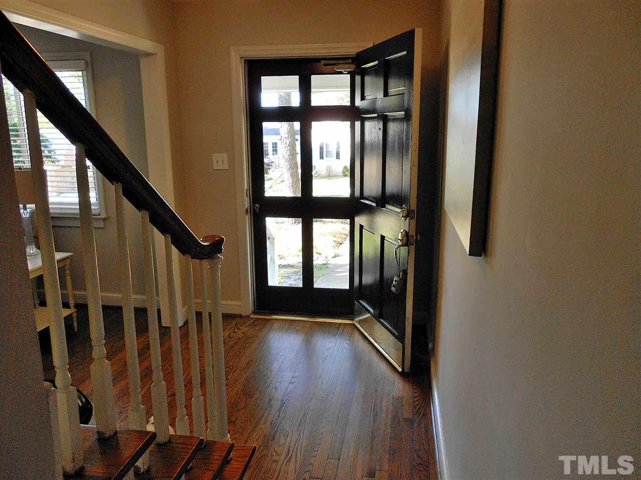 3307 Hall Place Raleigh, NC 27607 - Photo 23 of 24 a view of an entryway with wooden floor and door