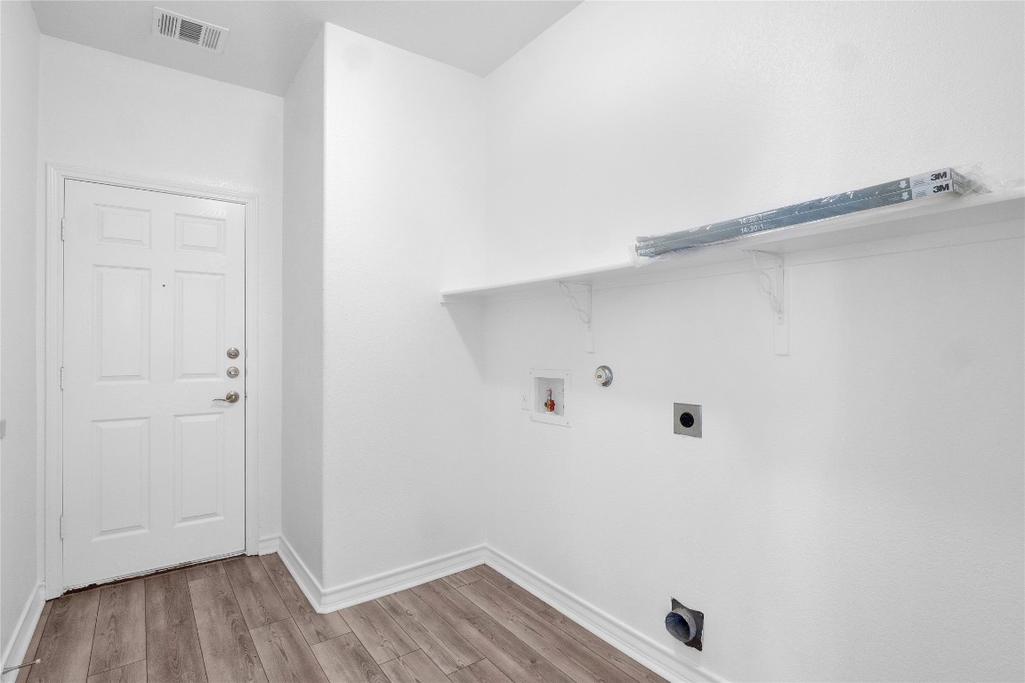 10217 English Oak Drive Austin, TX 78748 - Photo 16 of 31 a view of small space with racks on the wall