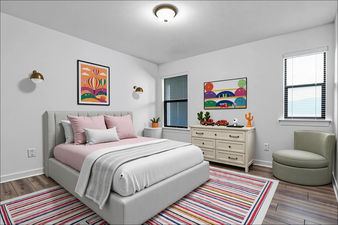 10217 English Oak Drive Austin, TX 78748 - Photo 24 of 31 a bedroom with a bed and wooden floor