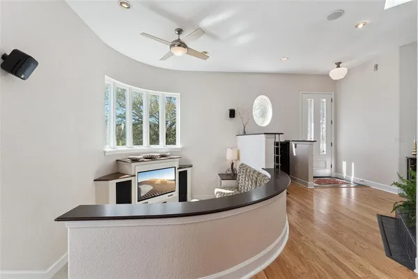 a kitchen with a sink a stove a refrigerator and cabinets