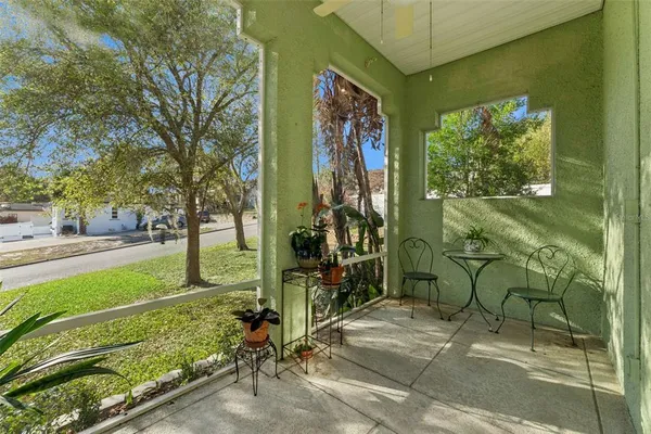 a kitchen with stainless steel appliances granite countertop a sink a stove and a wooden floors