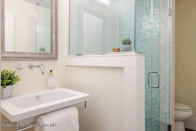 a view of backyard with outdoor seating and green space