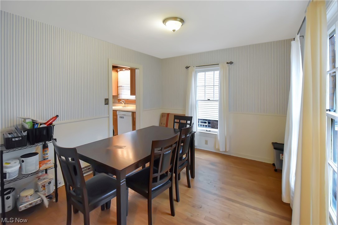 1068 Rushleigh Road Cleveland Heights, OH 44121 - Photo 13 of 22 Dining space with sink and light hardwood / wood-style floors