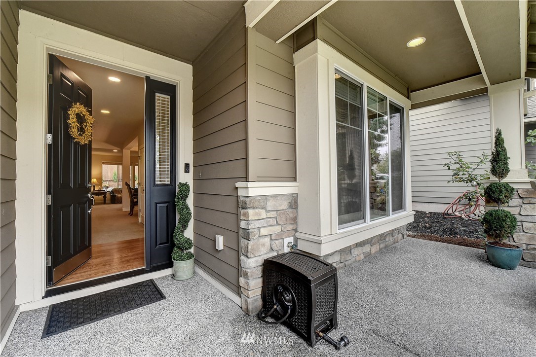 4321 229th Place Southeast Bothell, WA 98021 - Photo 2 of 31 a view of an entryway with a livingroom