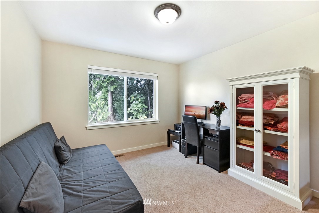4321 229th Place Southeast Bothell, WA 98021 - Photo 23 of 31 a bed room with a bed and a window