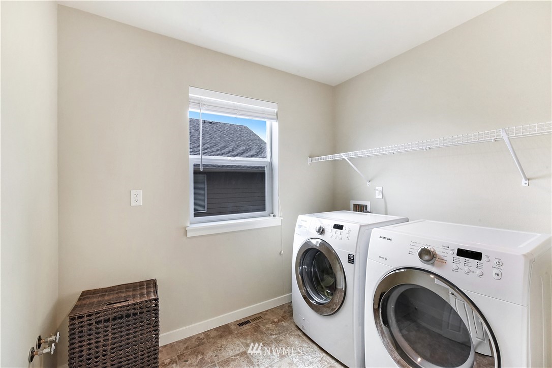 4321 229th Place Southeast Bothell, WA 98021 - Photo 25 of 31 a utility room with dryer and washer