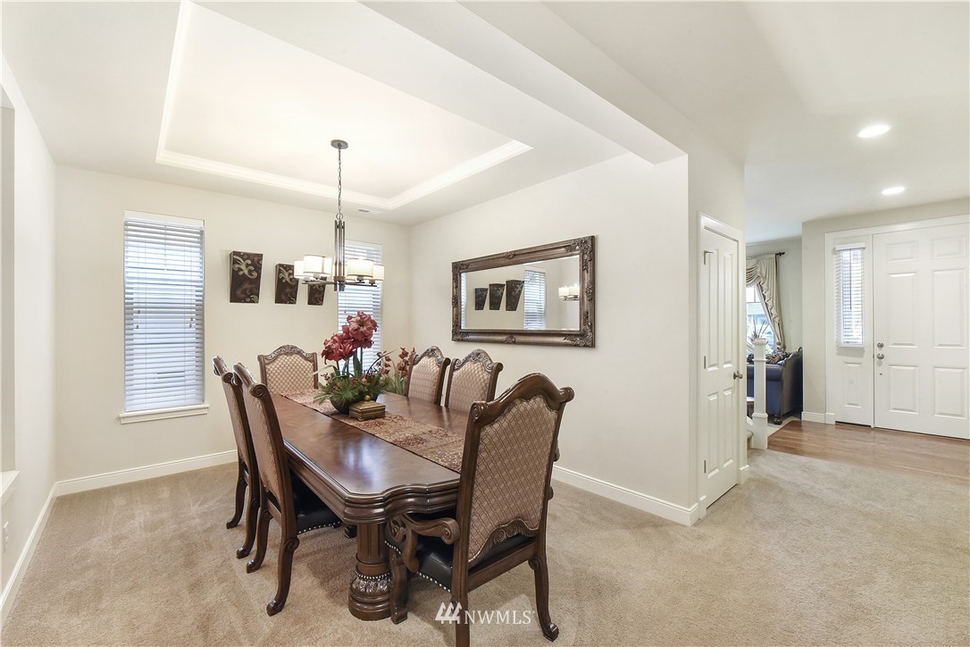 4321 229th Place Southeast Bothell, WA 98021 - Photo 5 of 31 a dining room with furniture and window