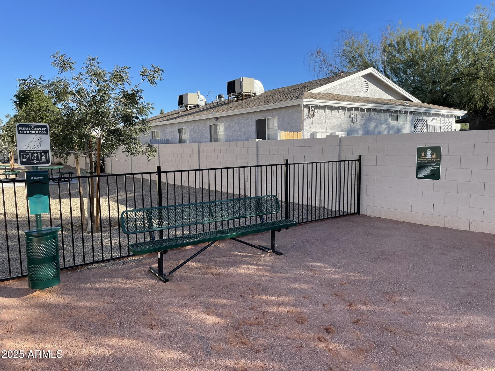 1222 East Mountain View Road, Unit 112 114 Phoenix, AZ 85020 - Photo 19 of 21 a view of a white house with a small yard and plants