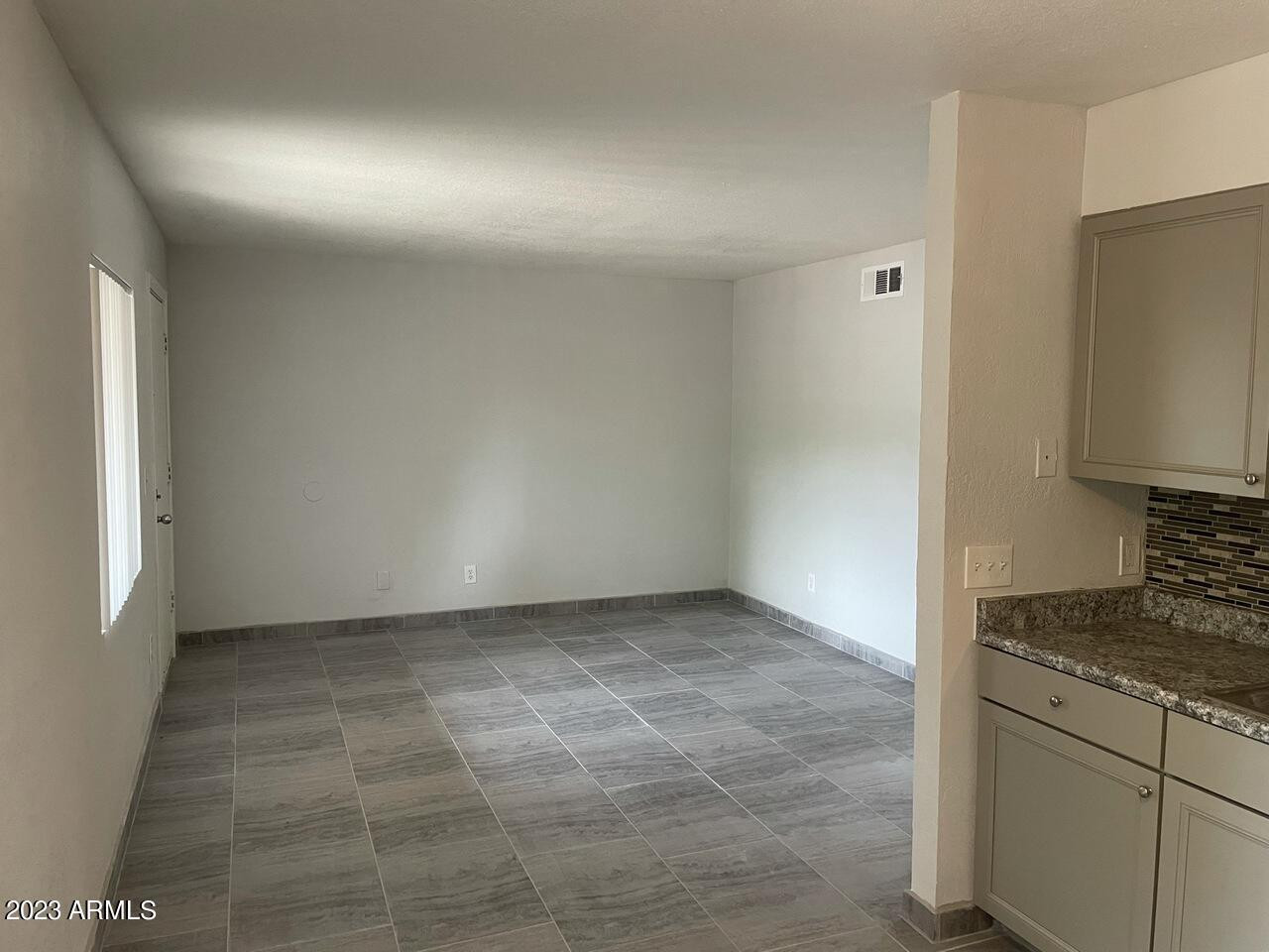 1222 East Mountain View Road, Unit 114 208 214 Phoenix, AZ 85020 - Photo 6 of 21 a view of kitchen and utility room