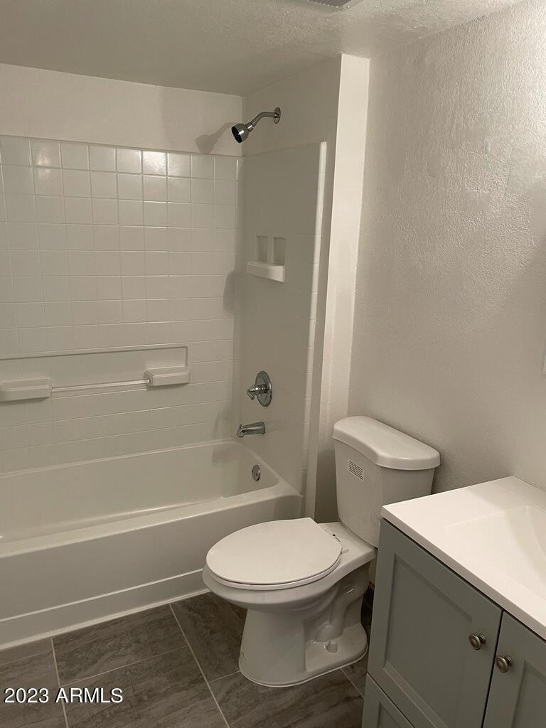 1222 East Mountain View Road, Unit 114 208 214 Phoenix, AZ 85020 - Photo 7 of 21 a bathroom with a toilet and a shower