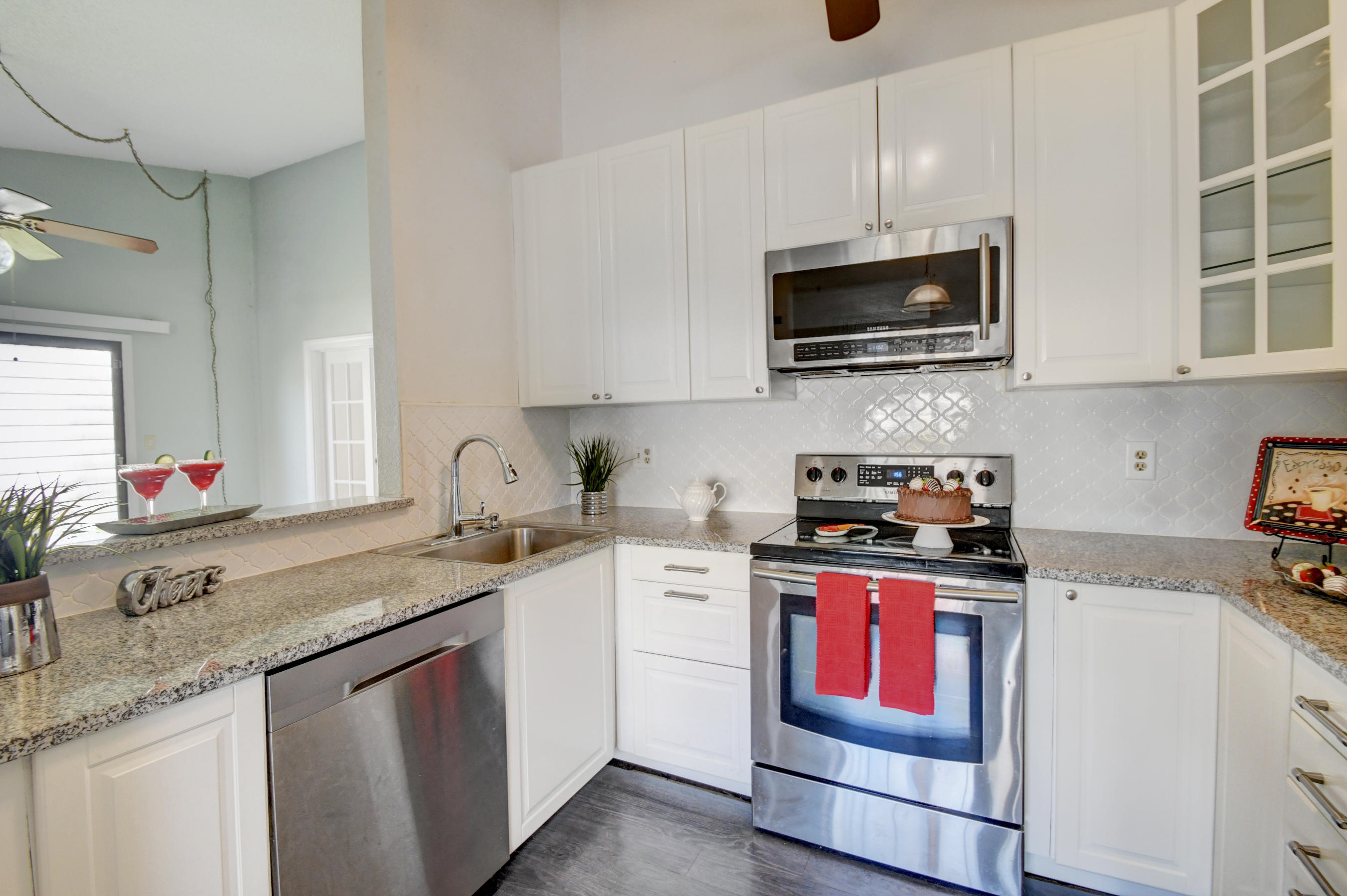 11134 Goss Lane Boca Raton, FL 33428 - Photo 7 of 32 Kitchen Open to Living Room