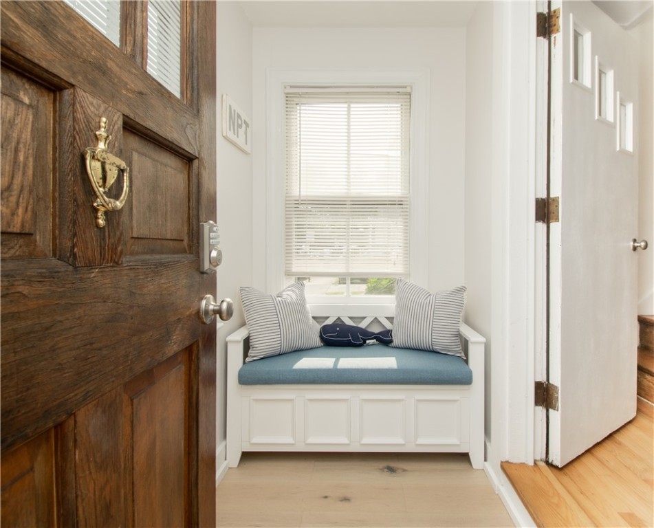 Welcoming enclosed mud room

