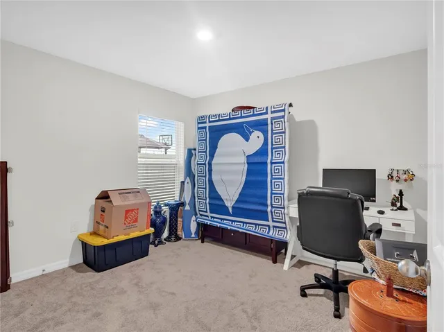 a room with furniture and a window