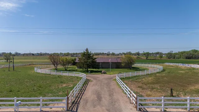 a view of a lake with a yard