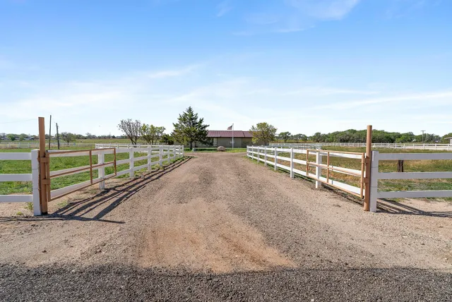 a view of a road with an ocean view
