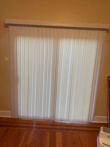 a view of a room with a window